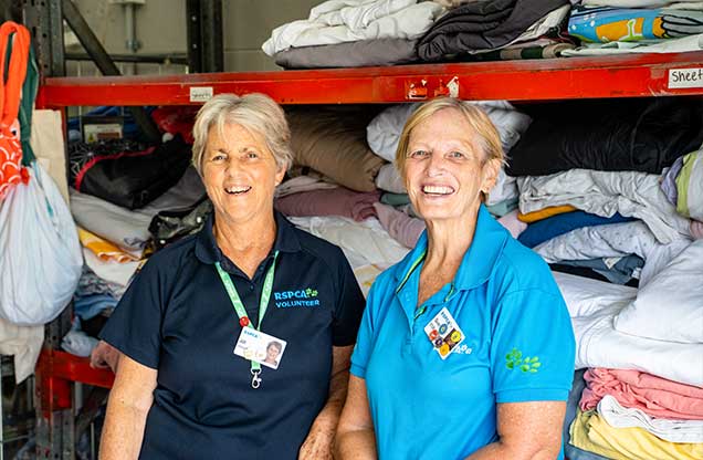 RSPCA Queensland volunteers Jill and Sue help in the laundry